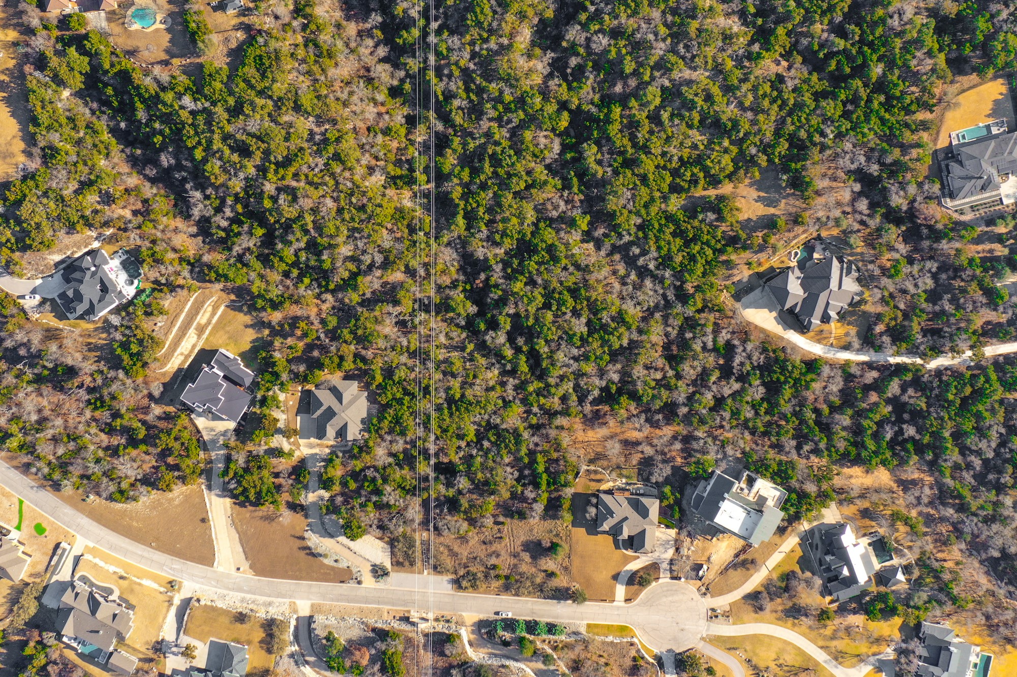 816 Laughing Dog Court Leander, TX 78641 - Photo 7 of 8 Aerial view of property's location with nearby suburban area