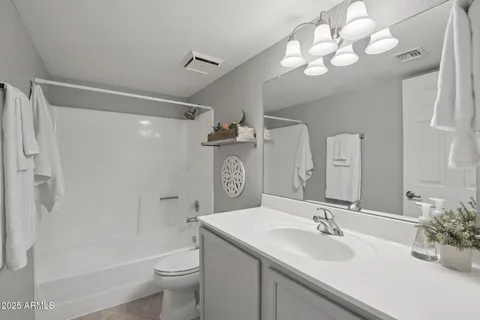 a view of a hallway with closet area