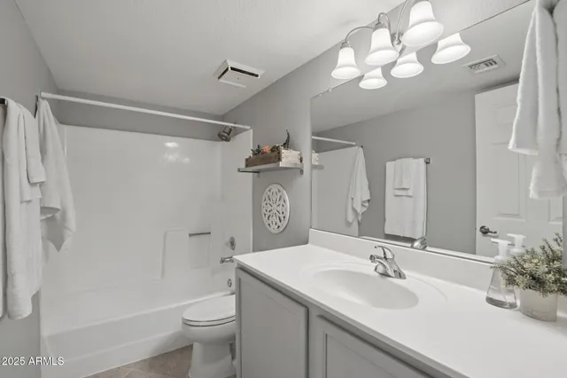 a view of a hallway with closet area