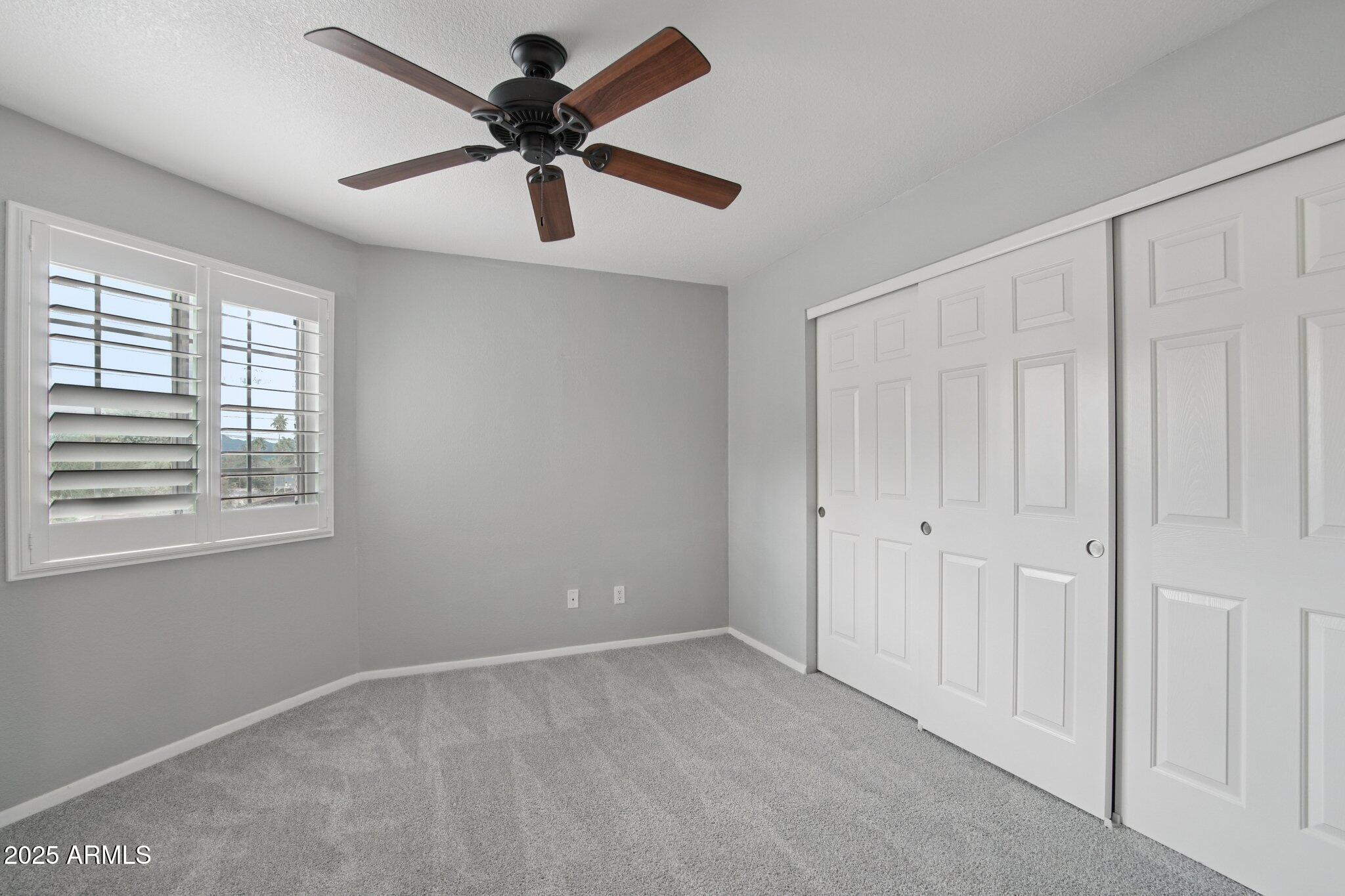 1720 East Thunderbird Road, Unit 2024 Phoenix, AZ 85022 - Photo 13 of 23 a view of an empty room with a window