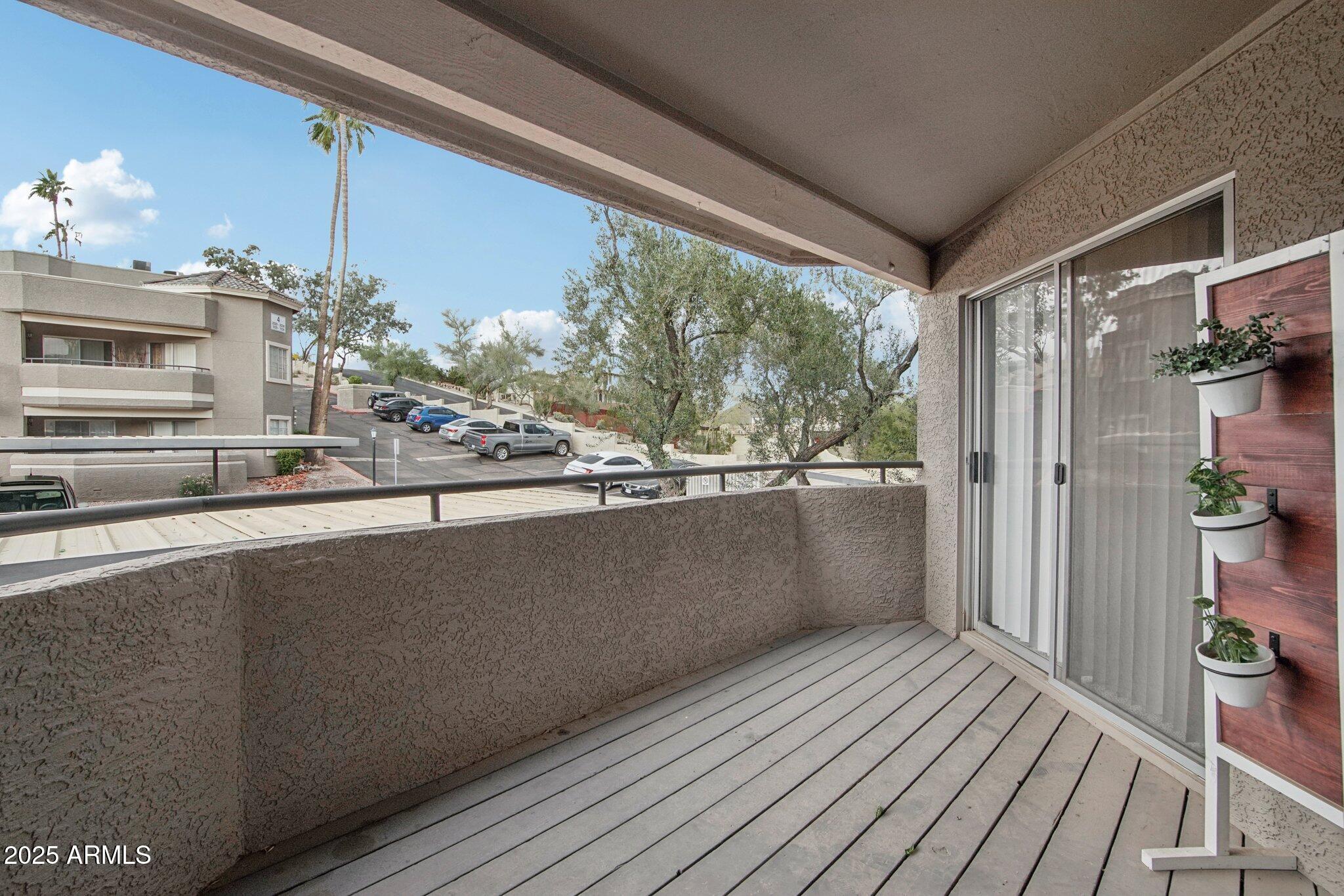 1720 East Thunderbird Road, Unit 2024 Phoenix, AZ 85022 - Photo 16 of 23 a view of a living room with a large window