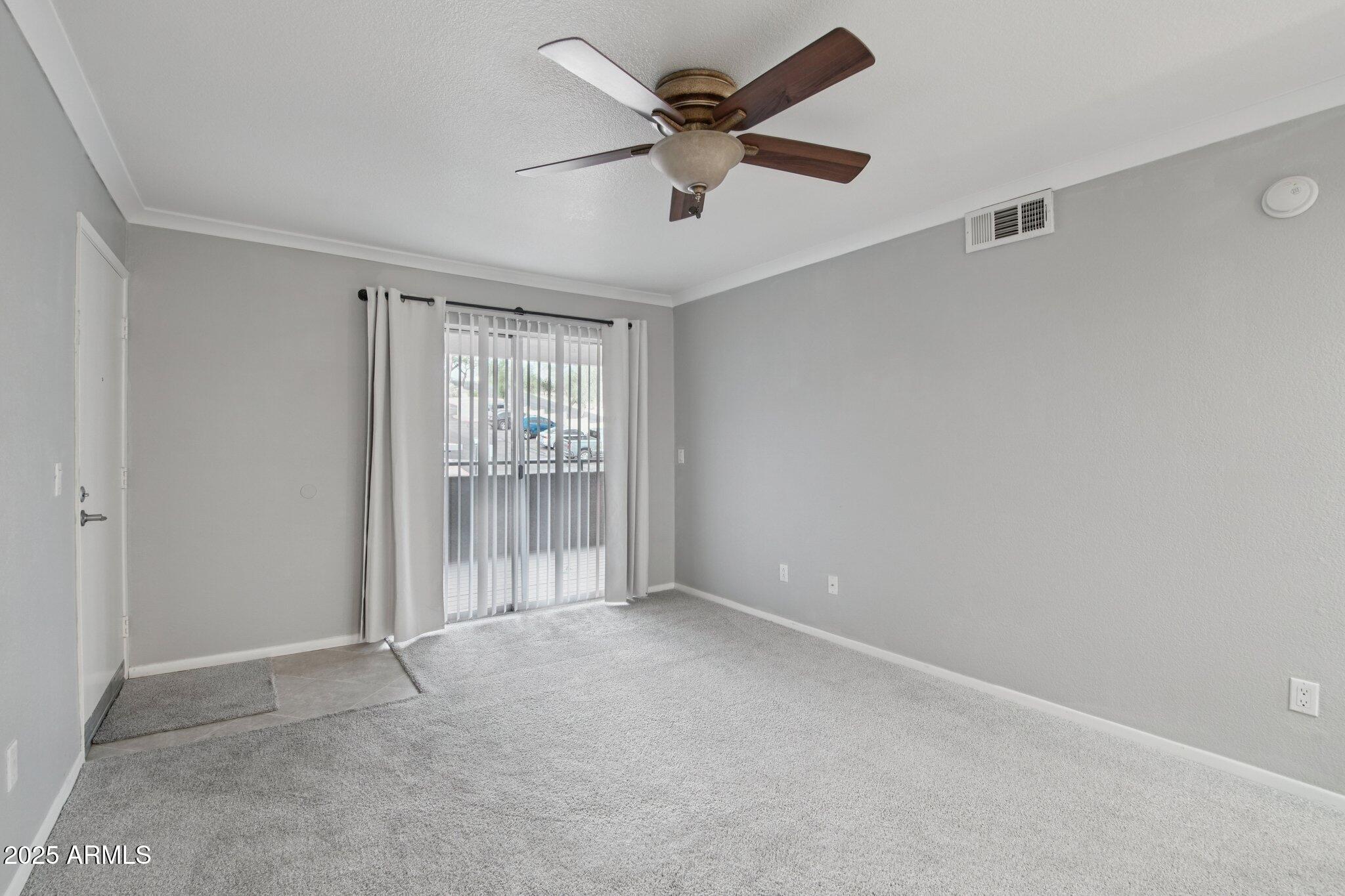 1720 East Thunderbird Road, Unit 2024 Phoenix, AZ 85022 - Photo 2 of 23 a view of an empty room with a window