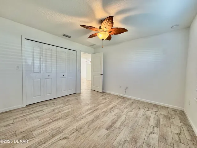 a view of a bathroom from a hallway
