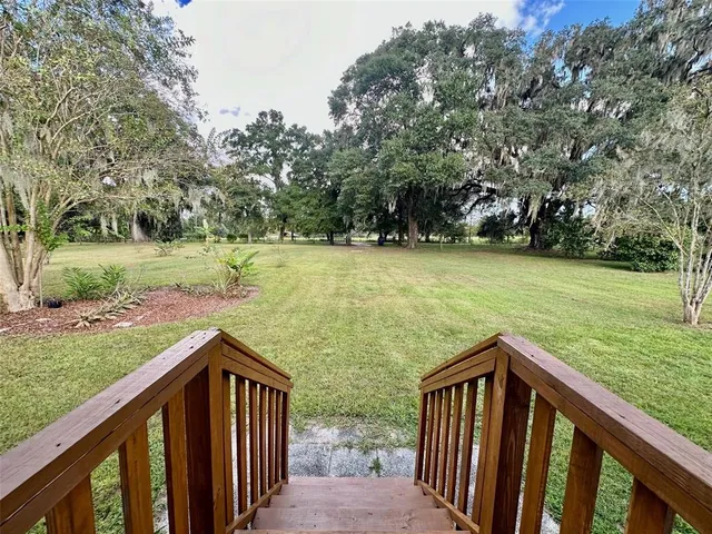 a view of outdoor space and yard