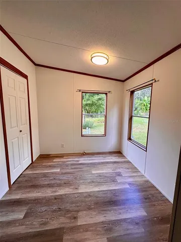 an empty room with windows