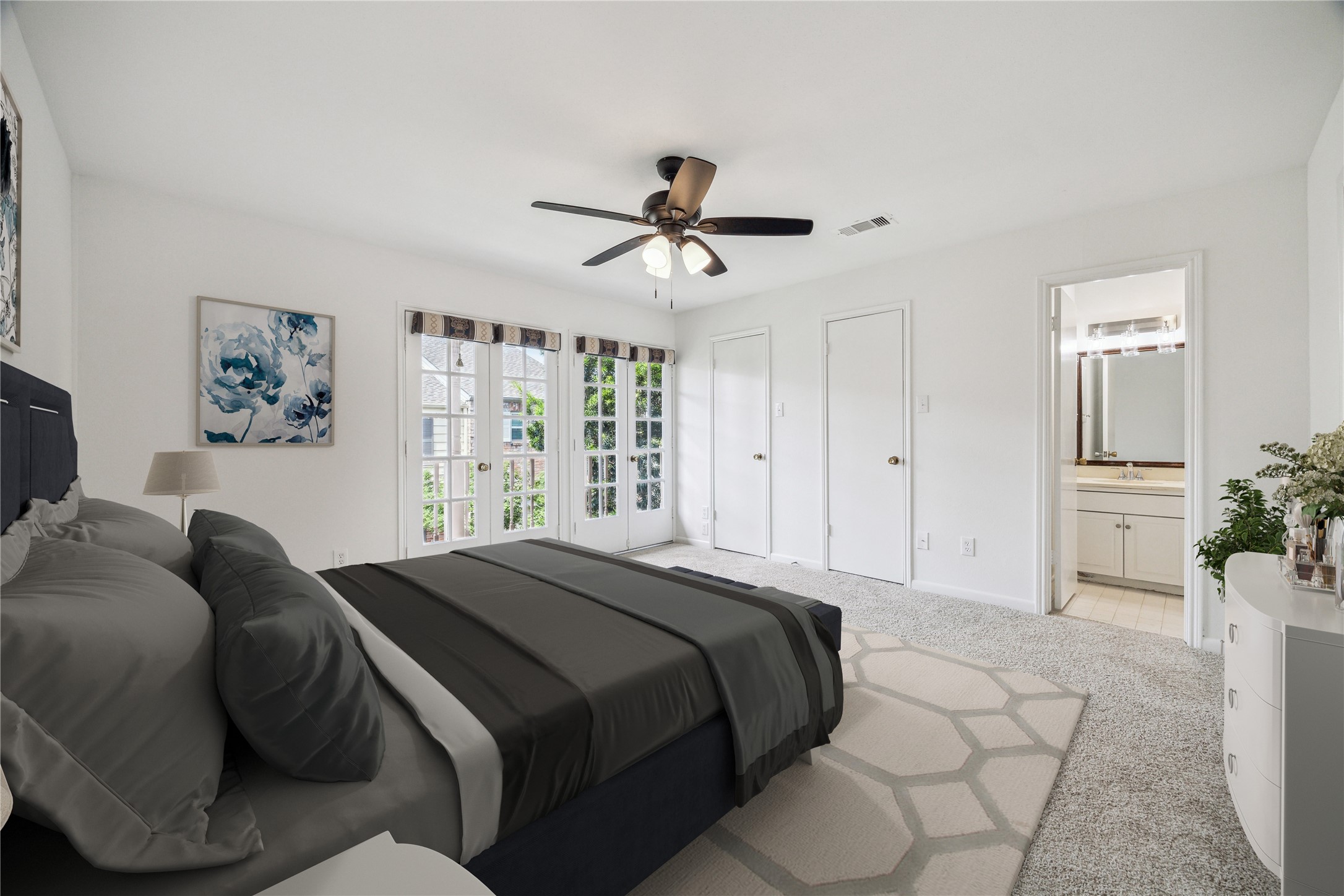 5827 Valley Forge Drive, Unit 83 Houston, TX 77057 - Photo 11 of 25 a bedroom with a bed and a chandelier