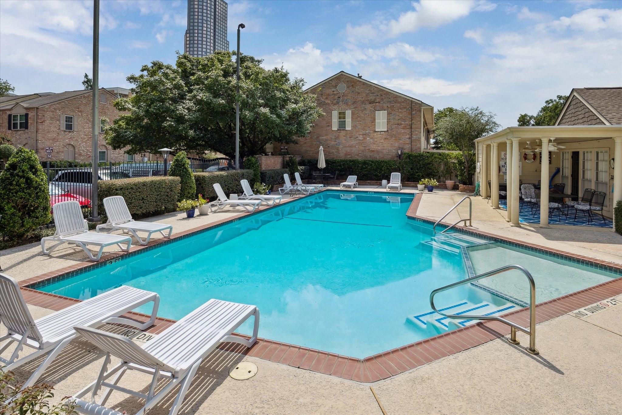 5827 Valley Forge Drive, Unit 83 Houston, TX 77057 - Photo 25 of 25 a view of a house with swimming pool and sitting area