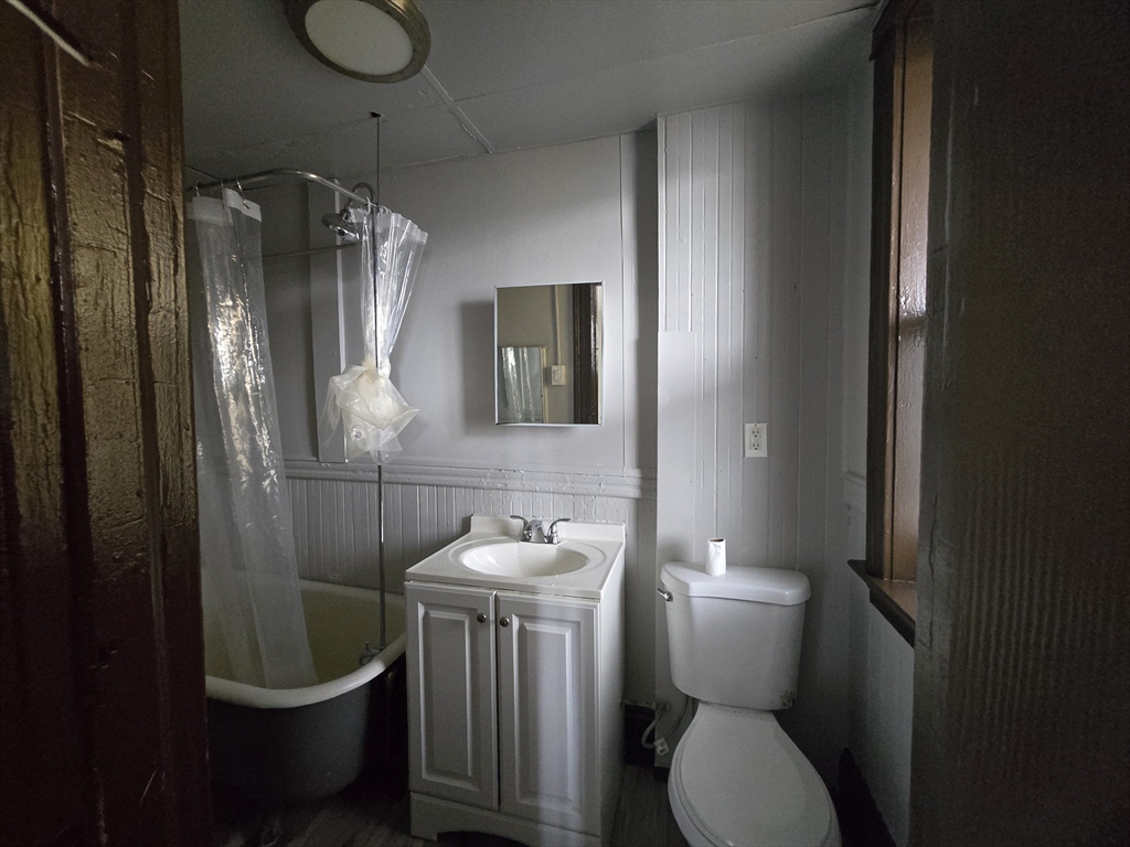 37 Clinton Avenue, Unit 5R Holyoke, MA 01040 - Photo 8 of 9 a bathroom with a toilet and a sink