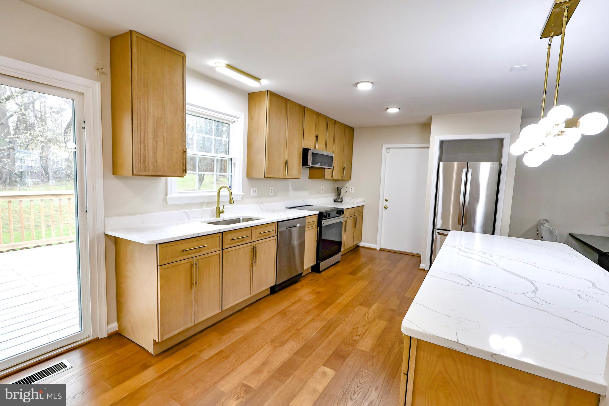 2800 Gunarette Way Silver Spring, MD 20906 - Photo 12 of 48 Well illuminated kitchen lovely natural lighting.