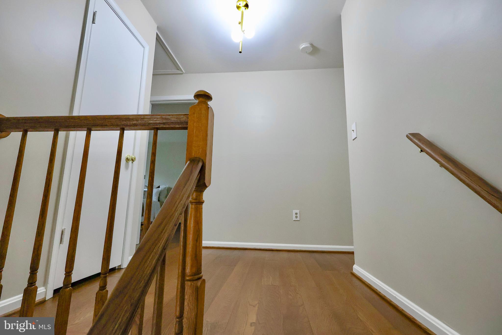 2800 Gunarette Way Silver Spring, MD 20906 - Photo 14 of 48 Stairs and hall for upstairs.