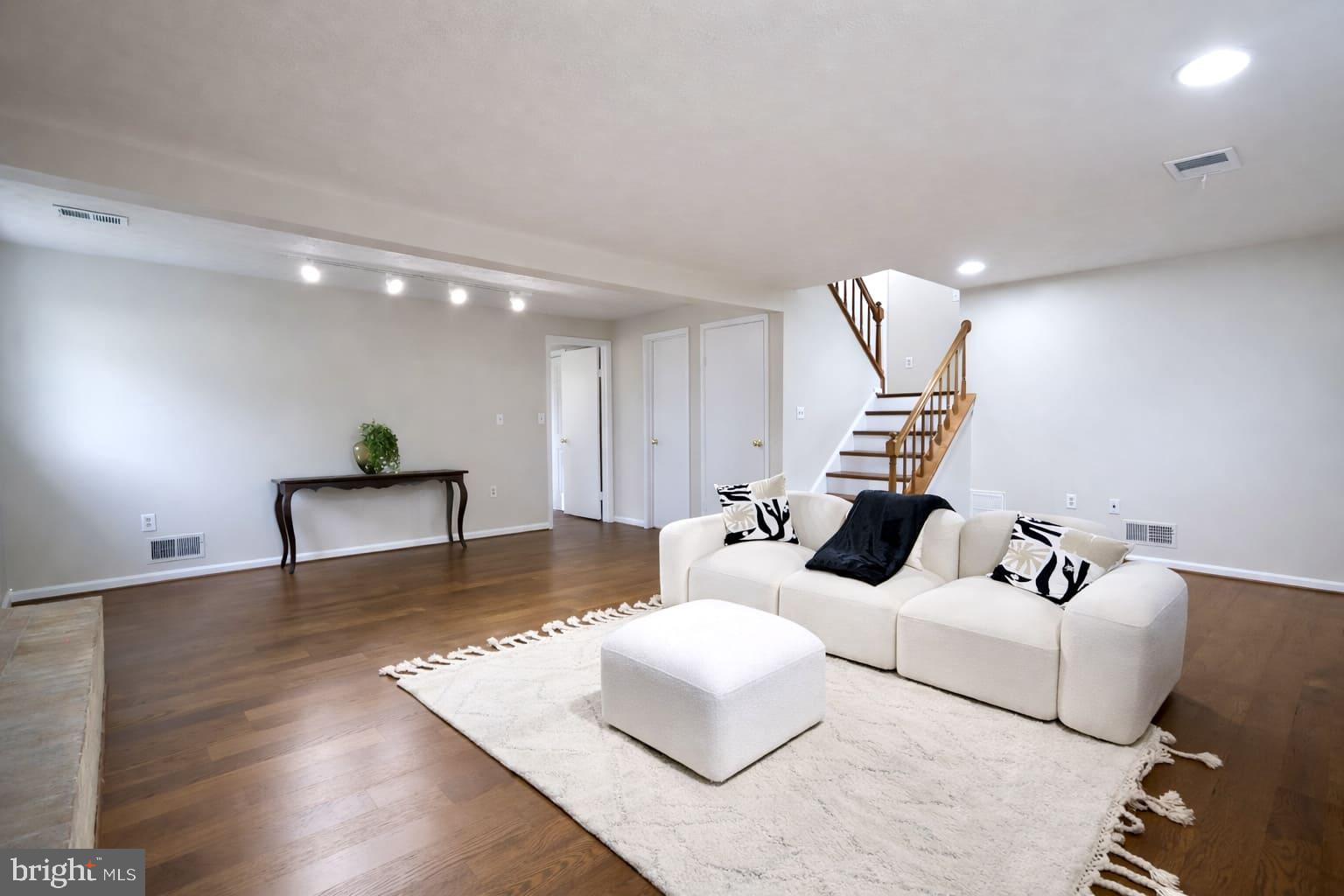 2800 Gunarette Way Silver Spring, MD 20906 - Photo 16 of 48 Large den ready for you to be cozy on the couch.