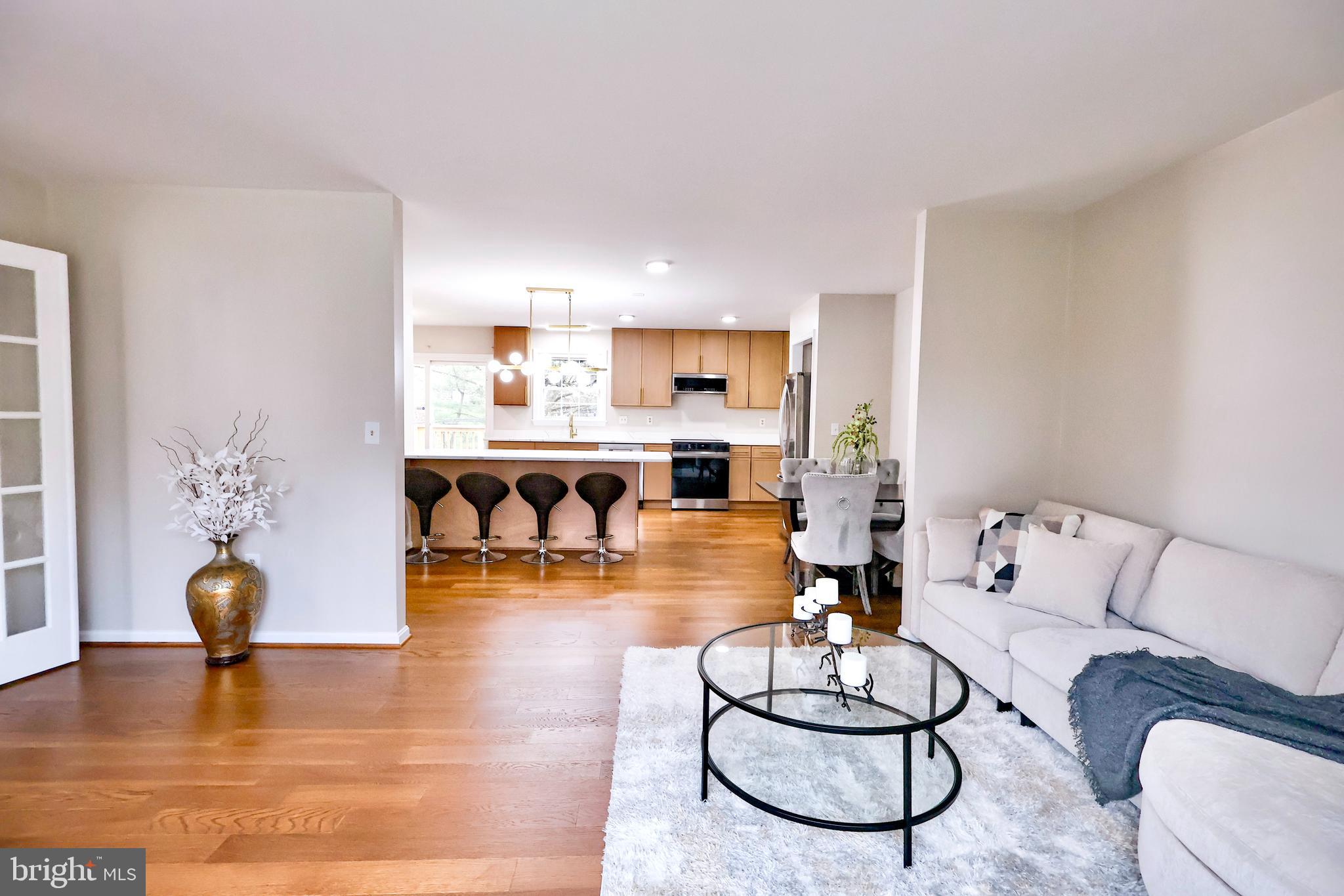 2800 Gunarette Way Silver Spring, MD 20906 - Photo 3 of 48 Living Room with open view of the kitchen area.