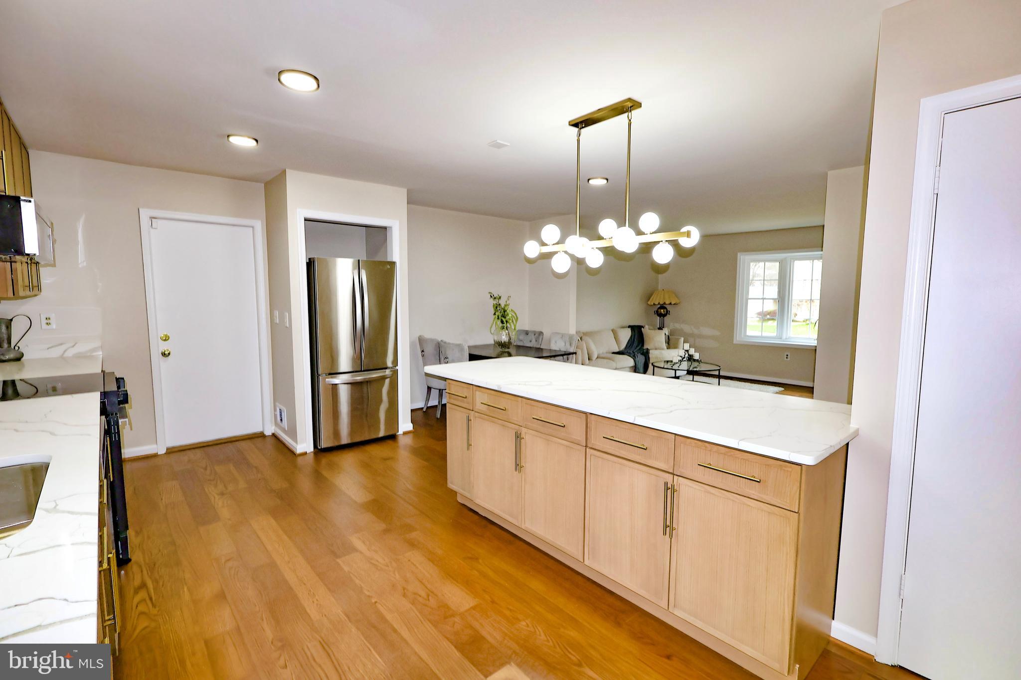 2800 Gunarette Way Silver Spring, MD 20906 - Photo 7 of 48 Beautiful large kitchen island ready to cook in!