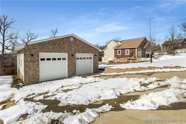 $825,000 | 61 Quiet Meadows Drive, Linn Creek, MO 65052