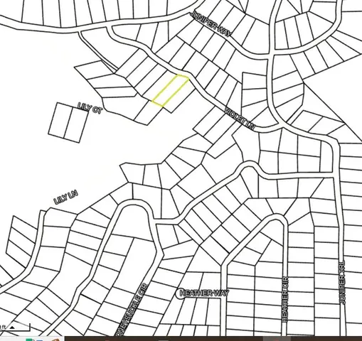 a view of a lake from a yard