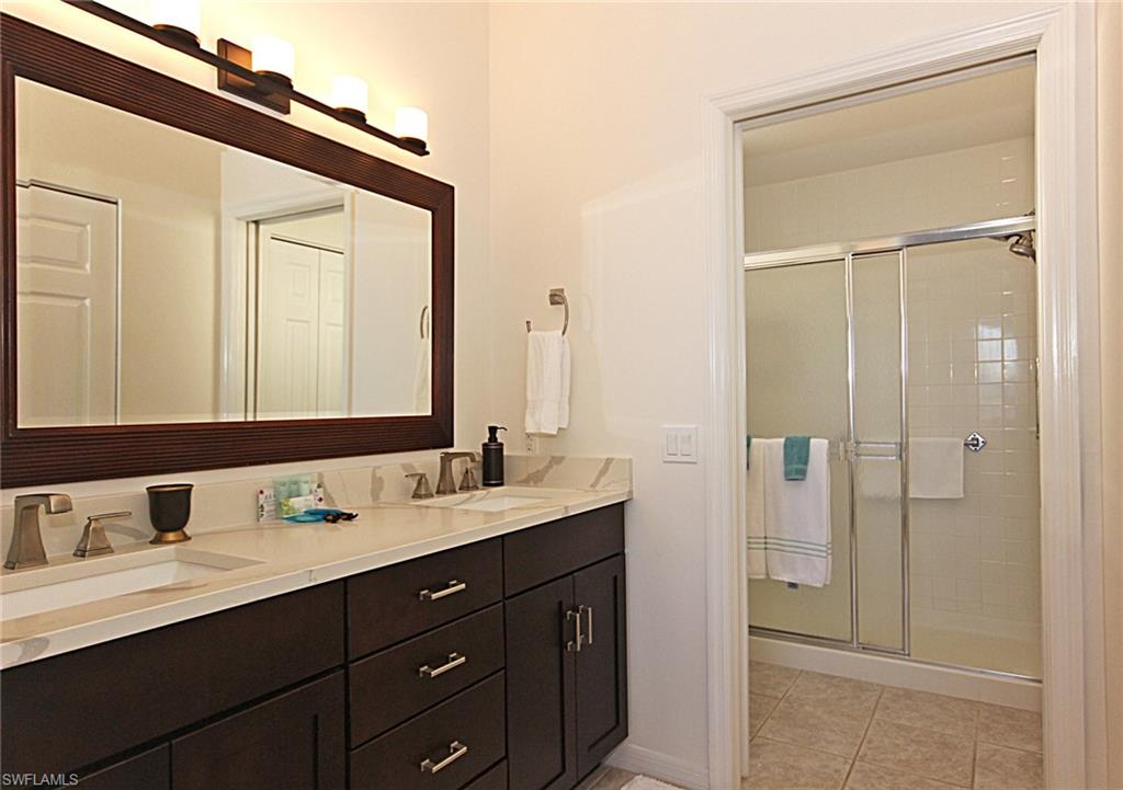 3380 West Crown Pointe Boulevard, Unit 102 Naples, FL 34112 - Photo 15 of 23 Master Bath, Step-in Shower