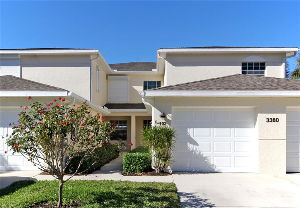 3380 West Crown Pointe Boulevard, Unit 102 Naples, FL 34112 - Photo 7 of 23 Attached Garage
