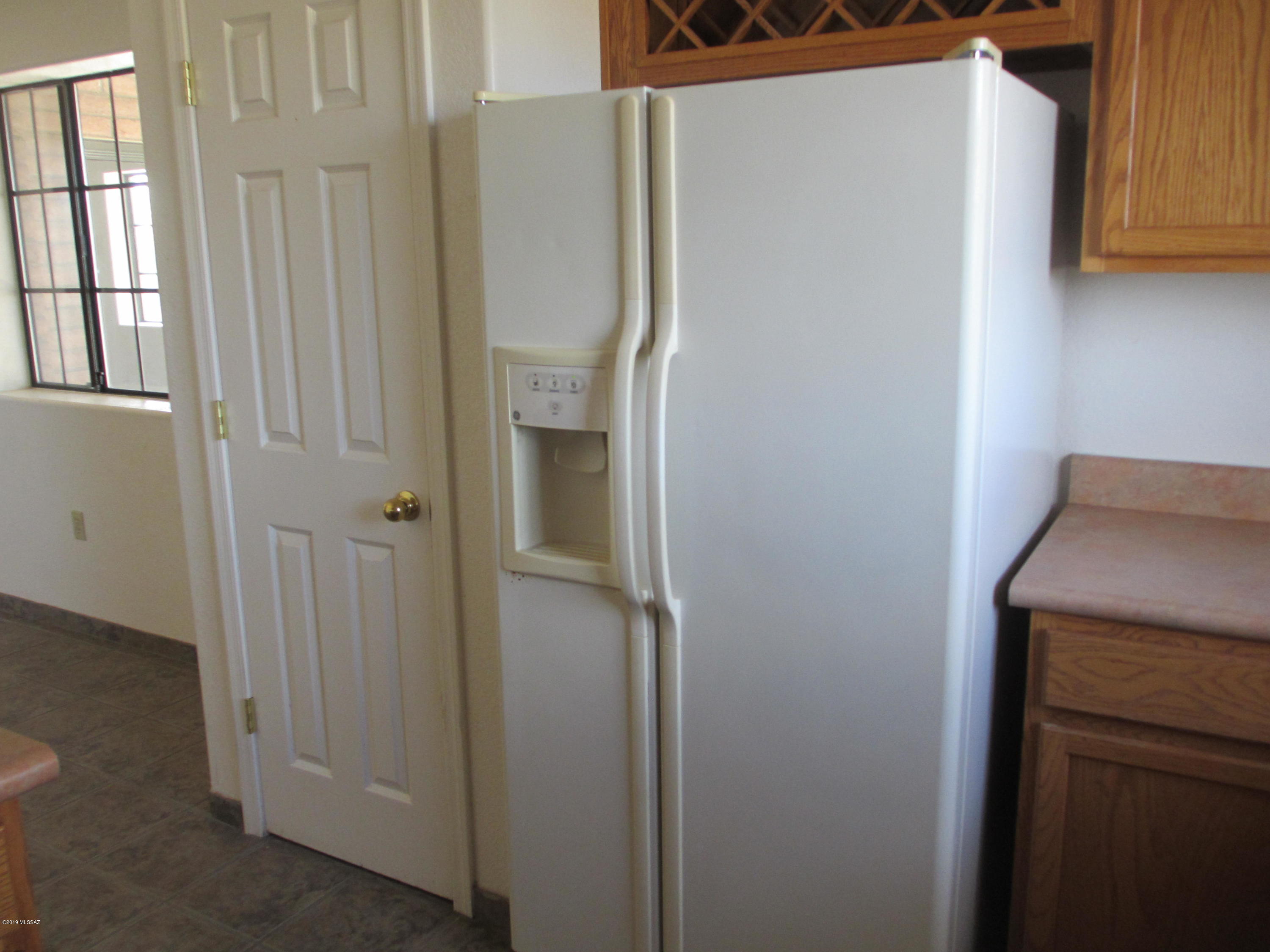 1084 Paseo Guebabi Rio Rico, AZ 85648 - Photo 15 of 33 a bathroom with a shower and a sink