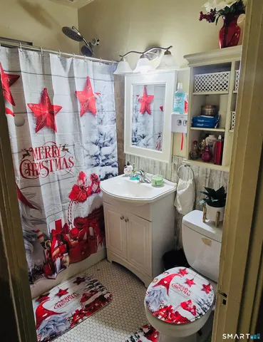 a room with furniture and a flat screen tv