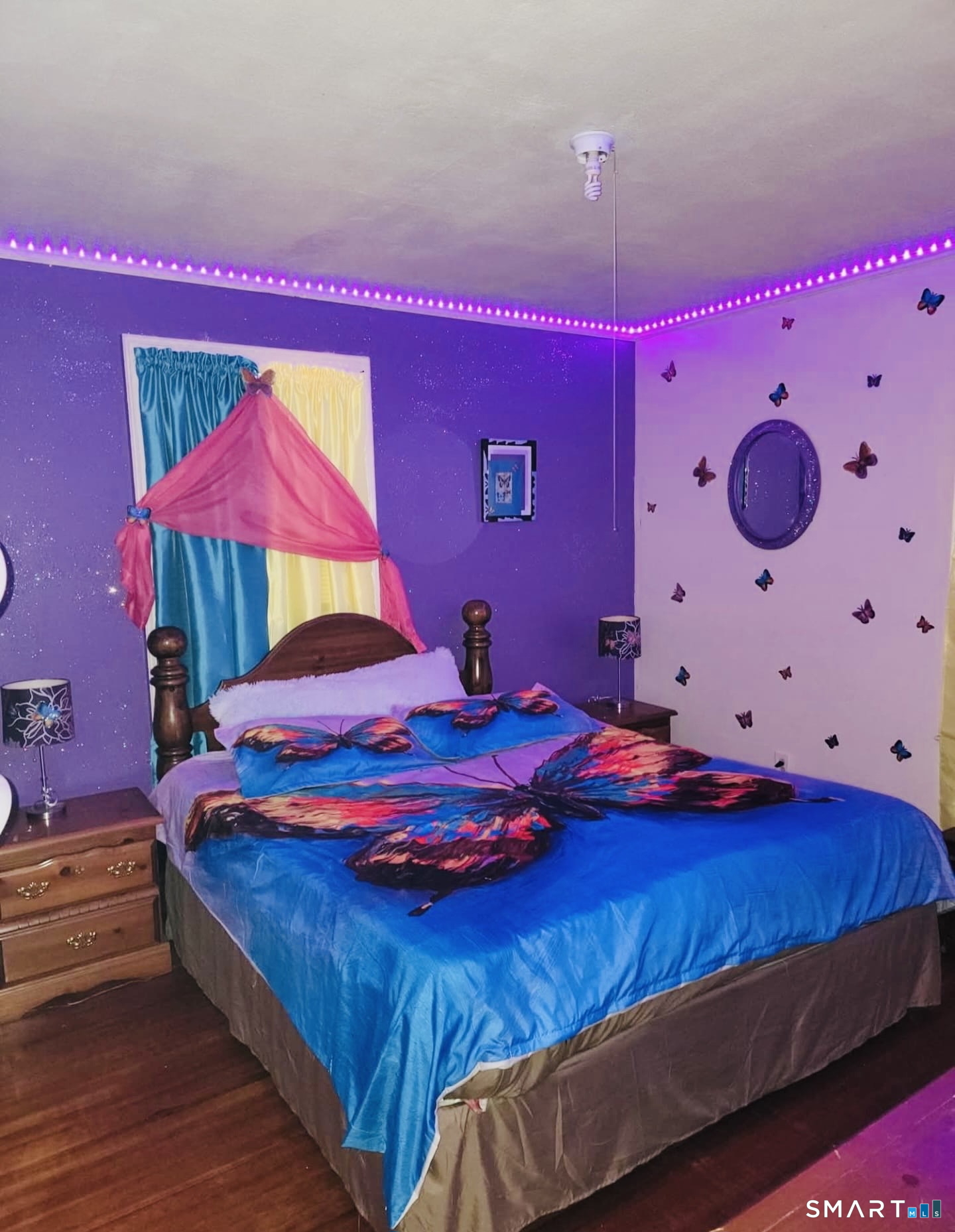 1954 Broad Street Hartford, CT 06114 - Photo 8 of 16 a bedroom with a bed and window