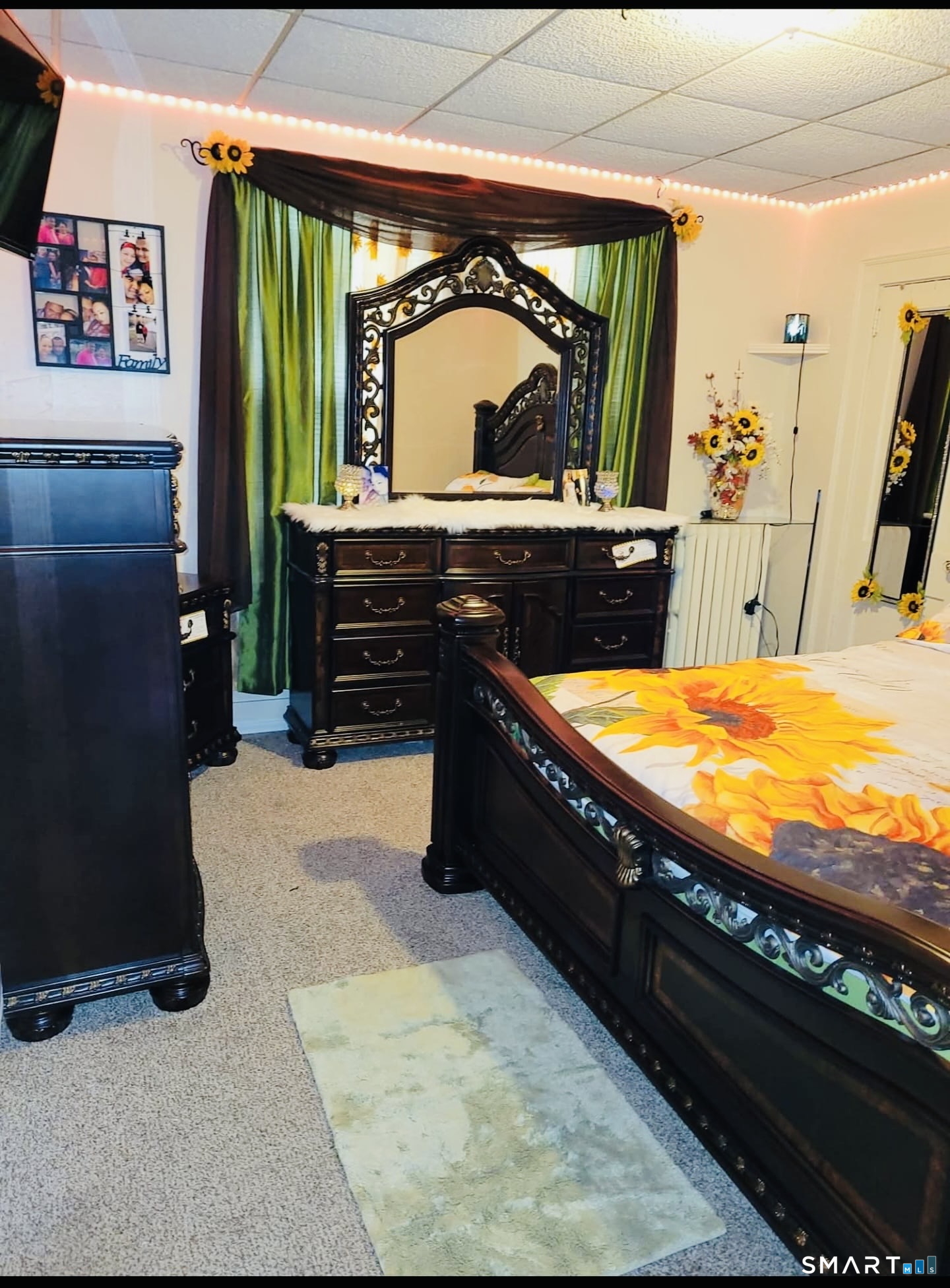 1954 Broad Street Hartford, CT 06114 - Photo 9 of 16 a room with furniture and a flat screen tv