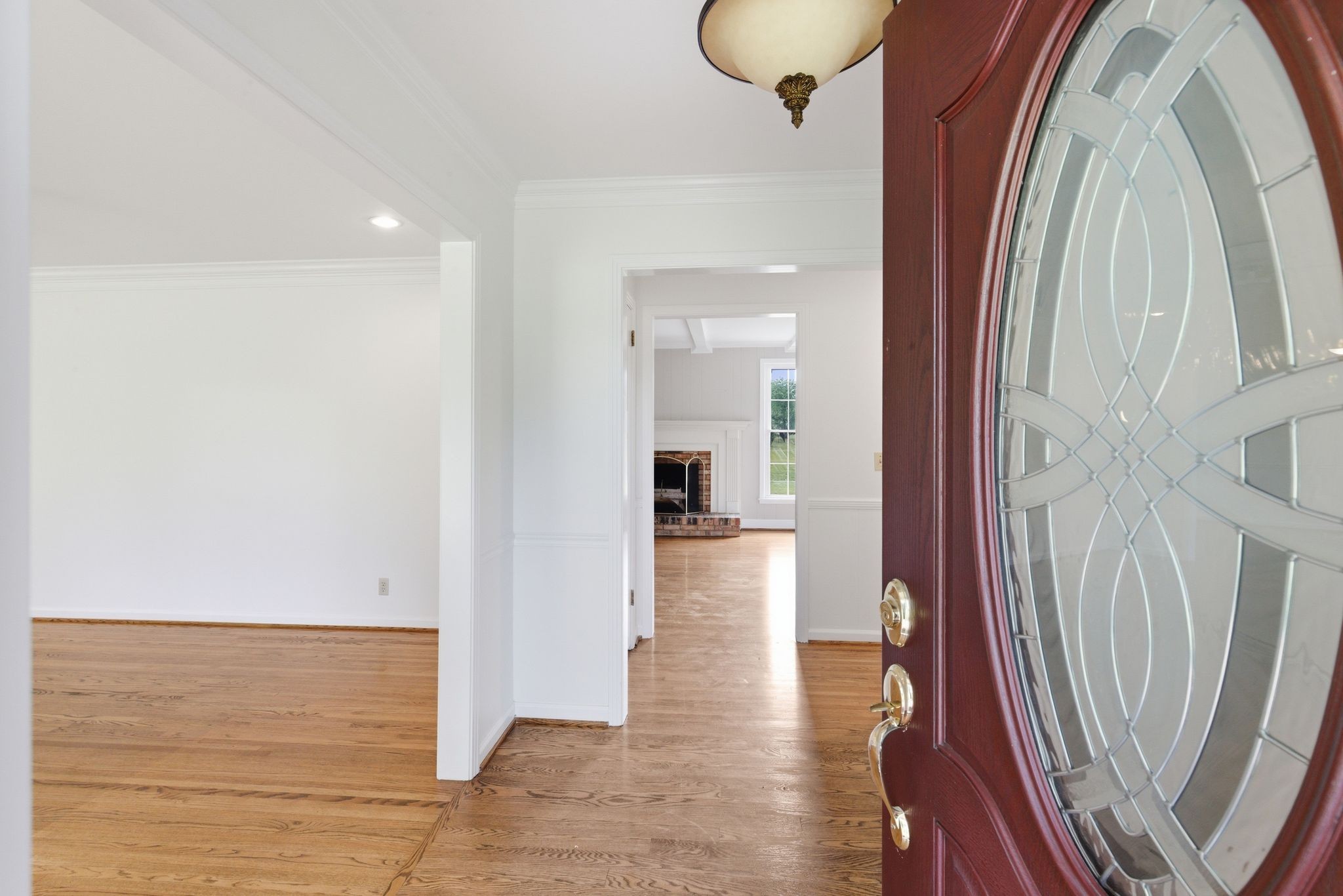 213 Rising Sun Lane Old Hickory, TN 37138 - Photo 10 of 37 a view of a hallway with wooden floor and staircase