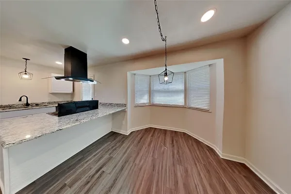 a very nice looking room with a wooden floor