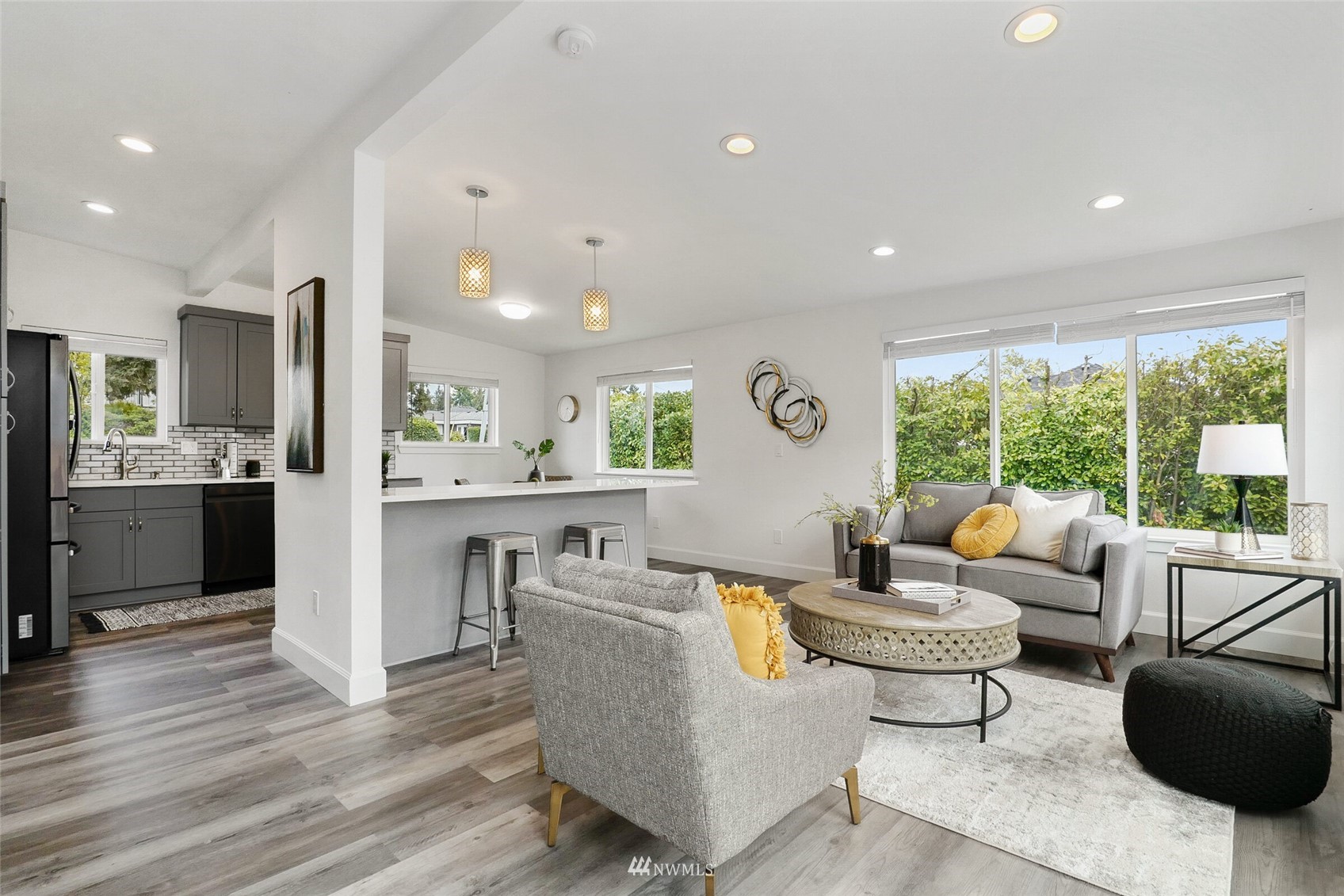 2009 Northeast 24th Street Renton, WA 98056 - Photo 1 of 22 a living room with furniture and a large window