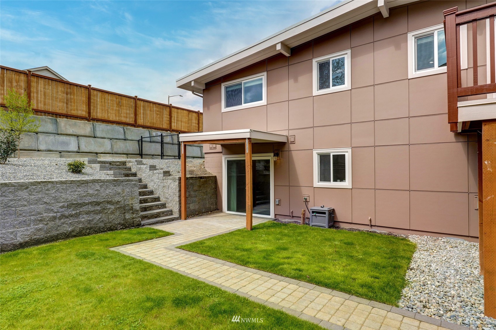 2009 Northeast 24th Street Renton, WA 98056 - Photo 21 of 22 a view of a backyard with plants and large tree