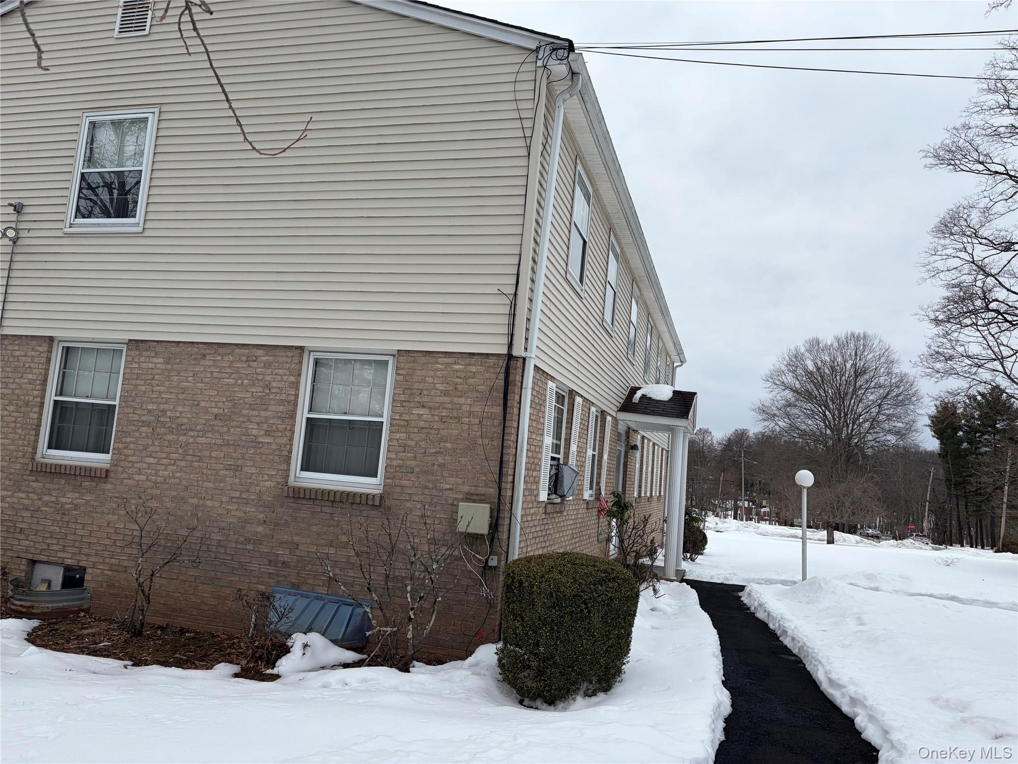 83 Gilchrest Road Valley Cottage, NY 10989 - Photo 4 of 5 a view of a house with a yard