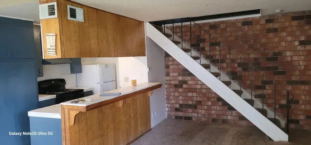 a view of kitchen with washer and dryer