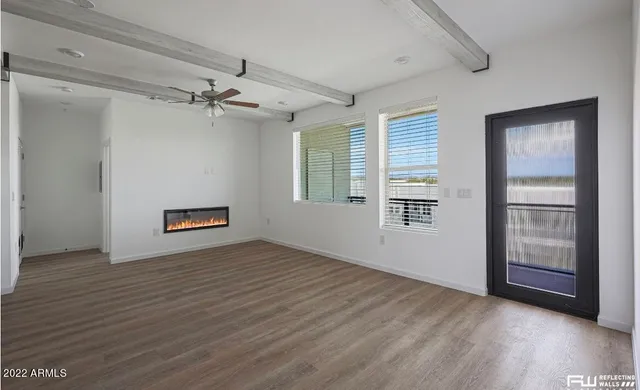 a view of an empty room with a window