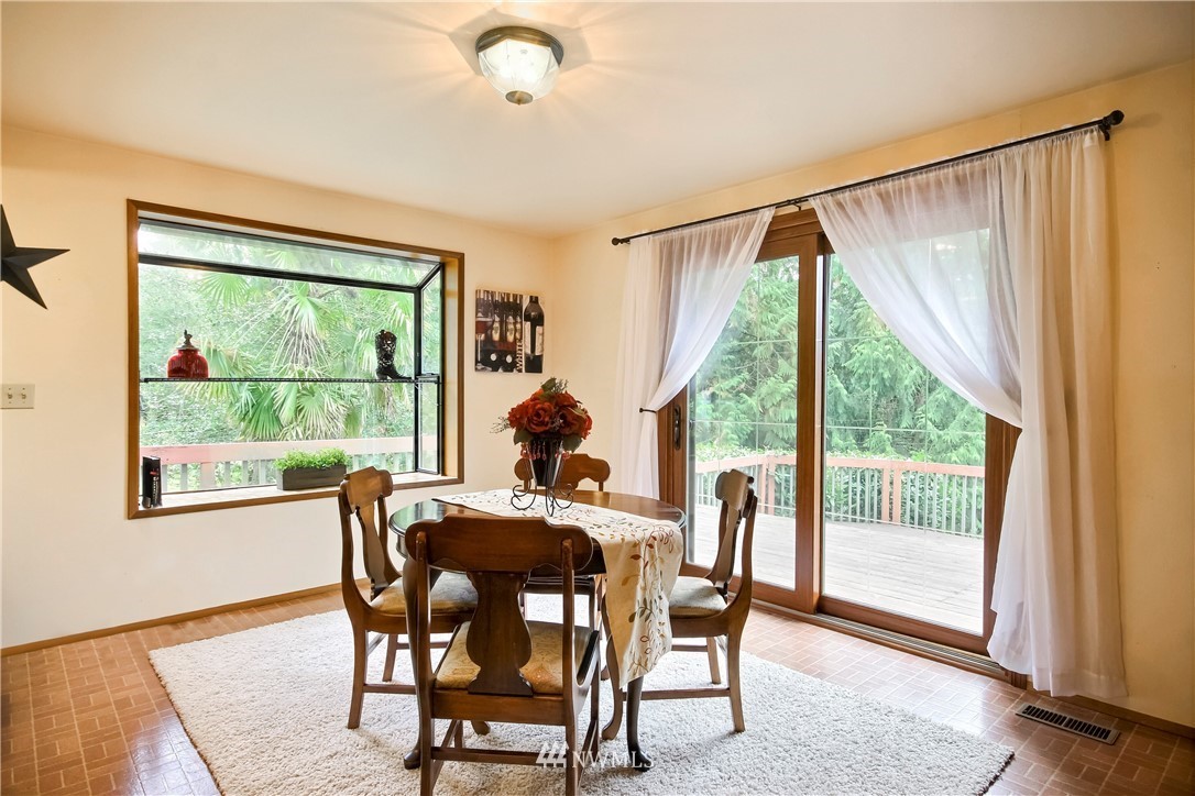 20109 Southeast 142nd Street Renton, WA 98059 - Photo 11 of 39 a dining room with furniture and window