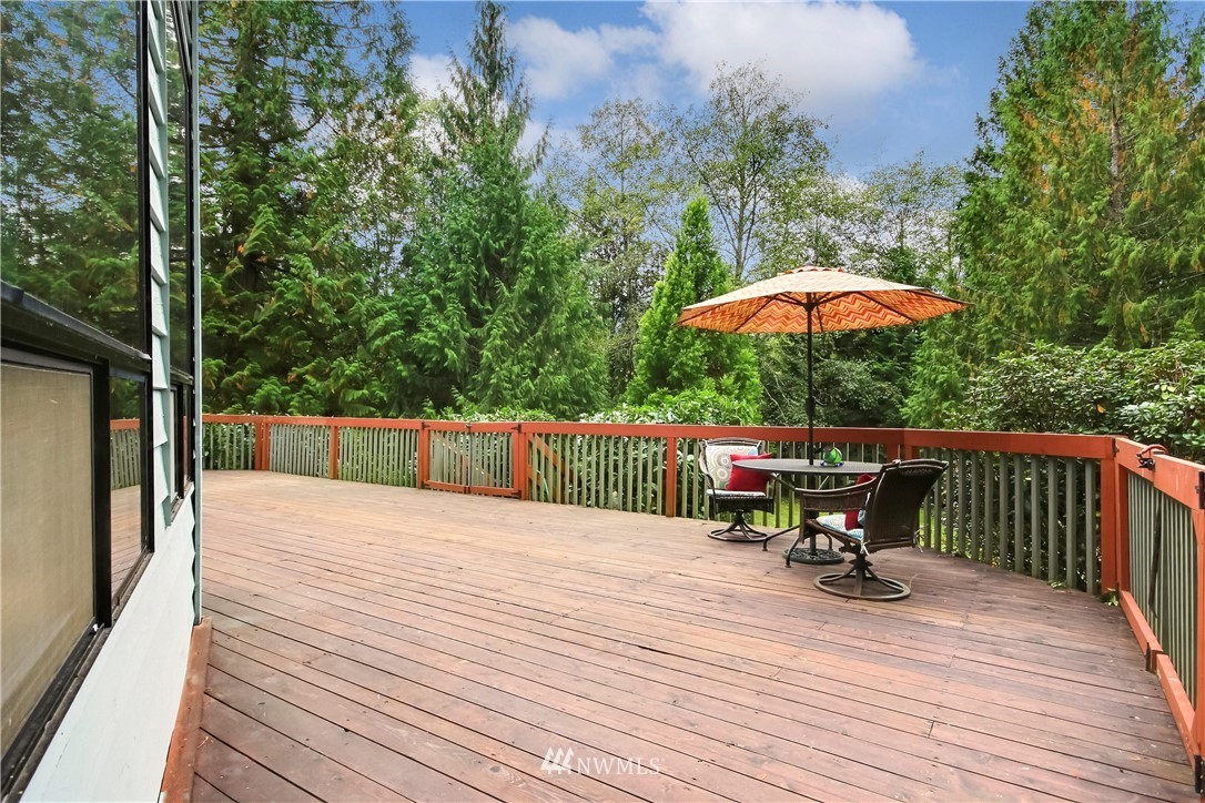 20109 Southeast 142nd Street Renton, WA 98059 - Photo 22 of 39 a view of a table and chairs on the roof deck