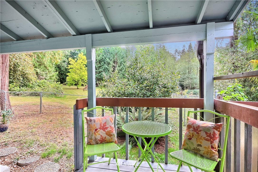 20109 Southeast 142nd Street Renton, WA 98059 - Photo 25 of 39 a view of a porch with furniture and wooden floor