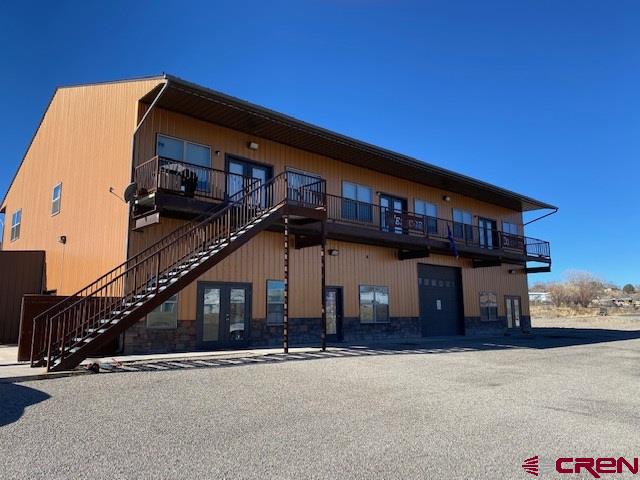 24194 Rd L Cortez, CO 81321 - Photo 1 of 30 front view of a house with a street
