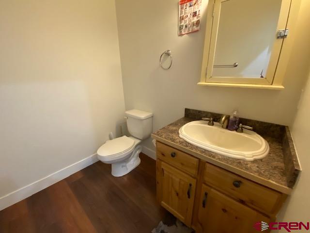 24194 Rd L Cortez, CO 81321 - Photo 21 of 30 a bathroom with a sink and a toilet