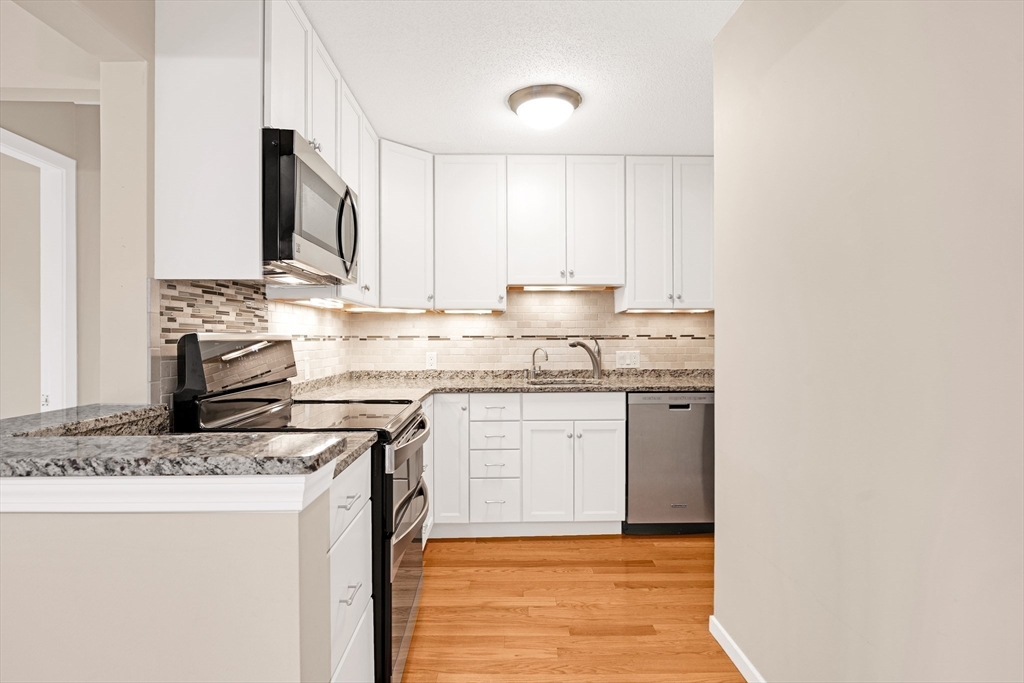 273 Cambridge Road, Unit 408 Woburn, MA 01801 - Photo 3 of 33