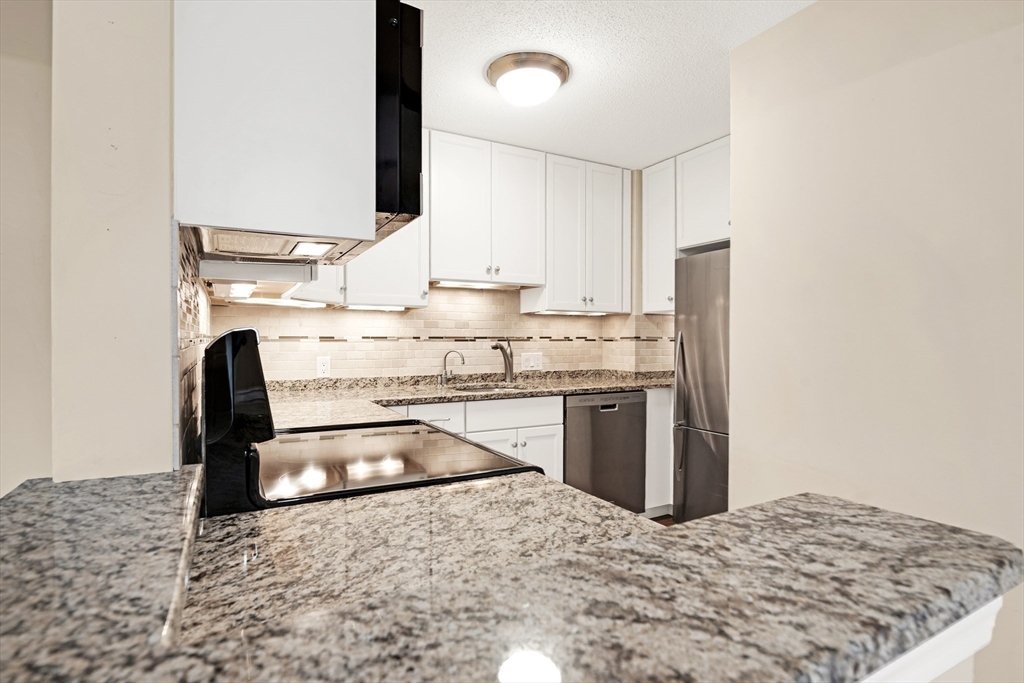 273 Cambridge Road, Unit 408 Woburn, MA 01801 - Photo 4 of 33