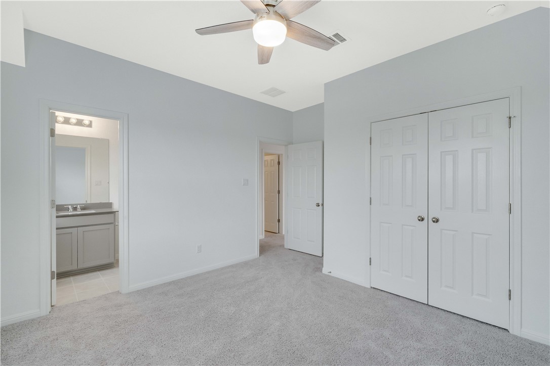 17629 Shafer Drive Pflugerville, TX 78660 - Photo 20 of 35 a view of an empty room with a ceiling fan