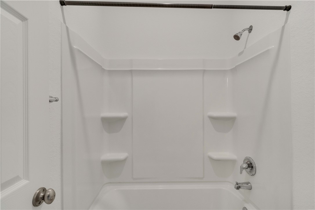 17629 Shafer Drive Pflugerville, TX 78660 - Photo 28 of 35 a bathroom with a bathtub