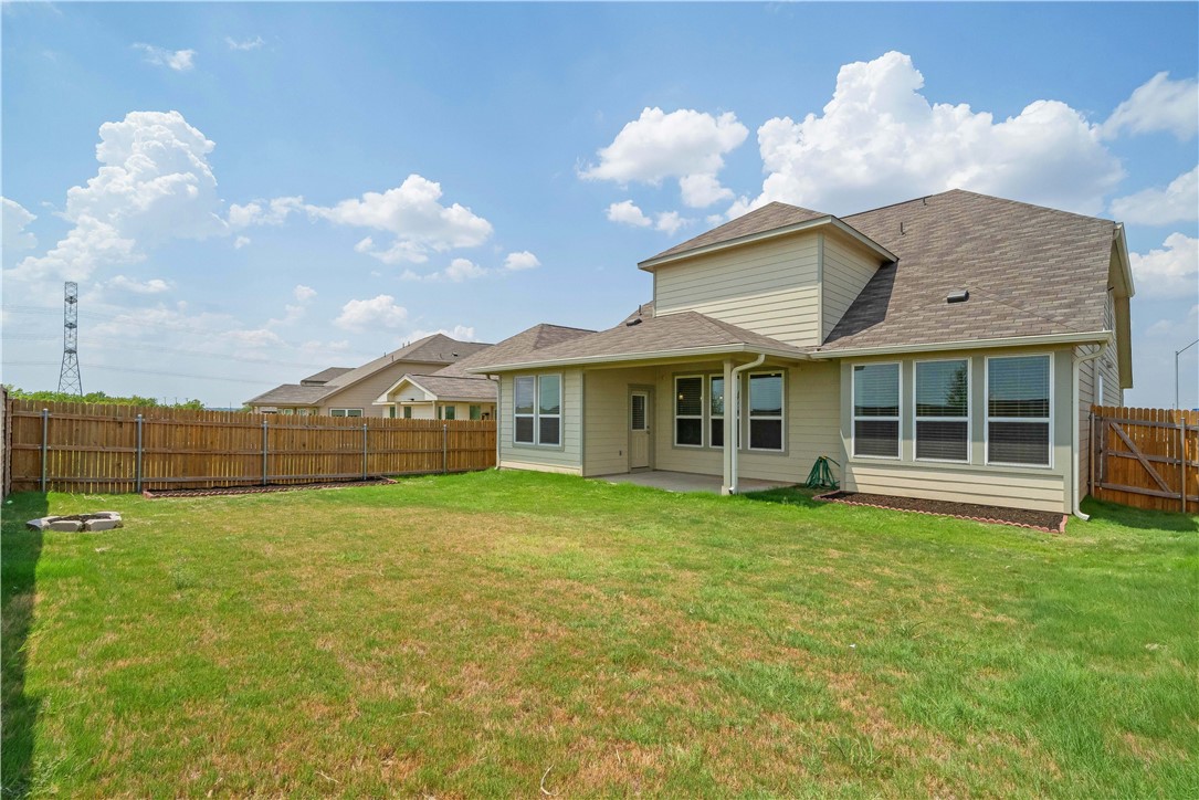 17629 Shafer Drive Pflugerville, TX 78660 - Photo 34 of 35 a view of a house with a yard and sitting area