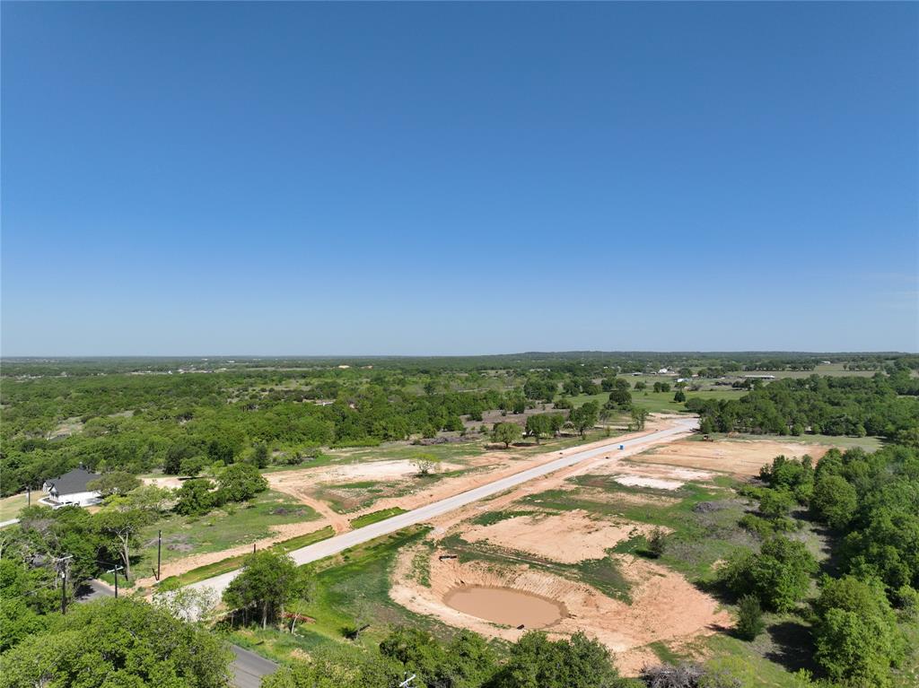 Lot 18 Dubois Road Poolville, TX 76487 - Photo 5 of 11 a view of an outdoor space and a yard
