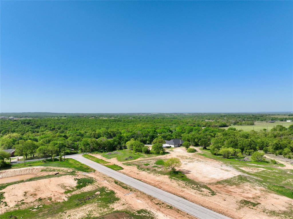 Lot 18 Dubois Road Poolville, TX 76487 - Photo 8 of 11 a view of a city street view with ocean view