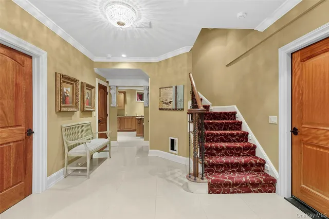 a view of livingroom and hall with wooden floor