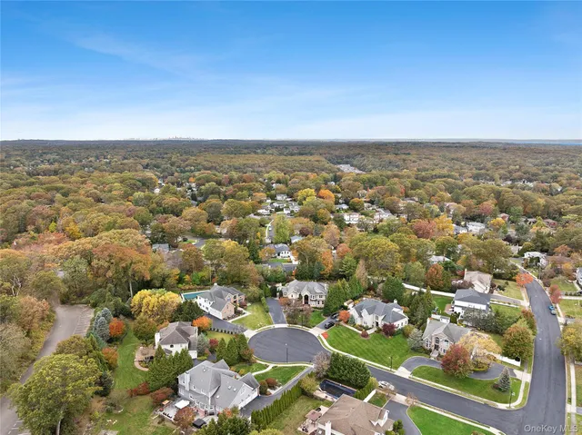 an aerial view of a city with lots of residential buildings
