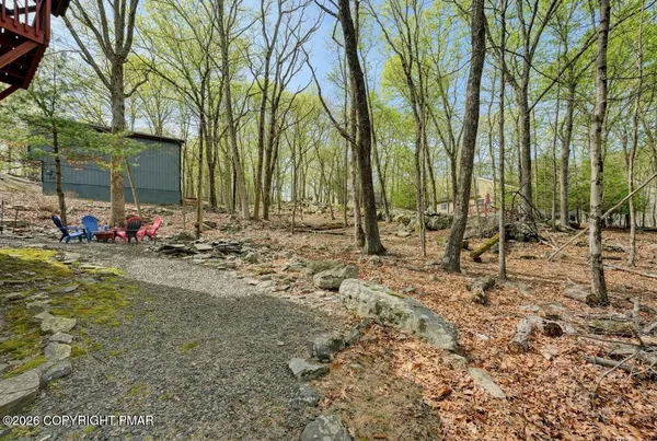 a backyard of a house with seating space
