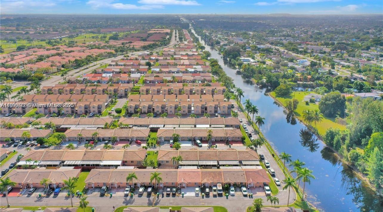 an aerial view of residential building and lake view