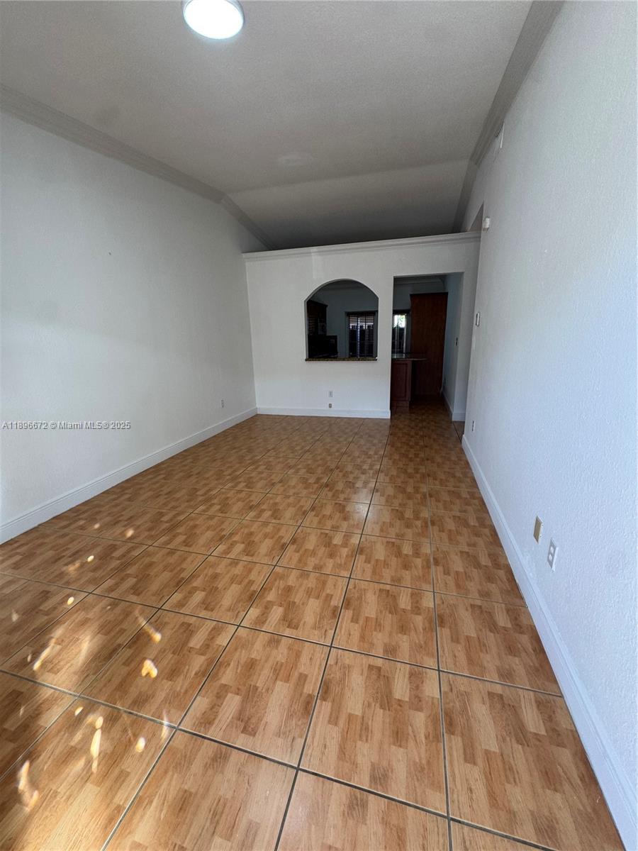 7667 Northwest 182nd Lane, Unit 805 Hialeah, FL 33015 - Photo 2 of 14 a view of empty room