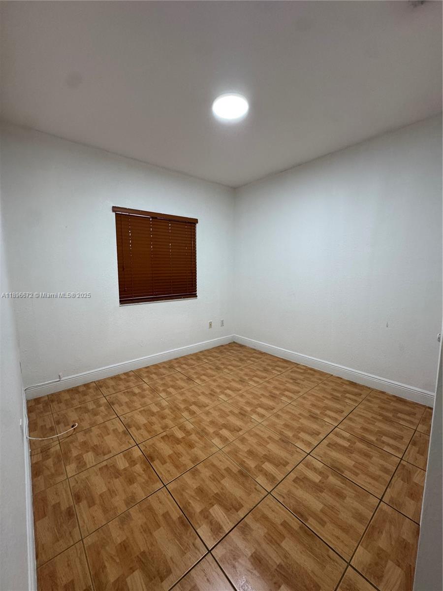 7667 Northwest 182nd Lane, Unit 805 Hialeah, FL 33015 - Photo 6 of 14 a view of an empty room
